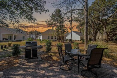 Patio terrace at dusk with area for grilling