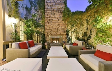 View of patio / terrace with an outdoor living spa