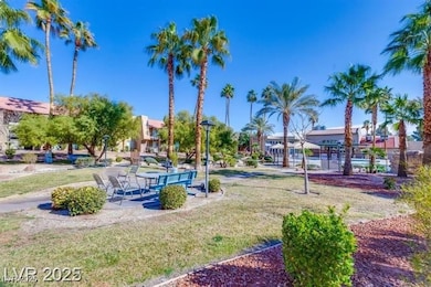 View of community with a yard and a patio area