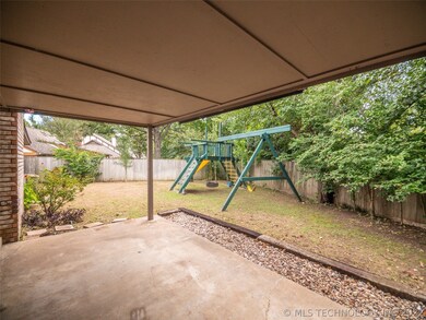 Backyard boasts large covered Patio, full privacy