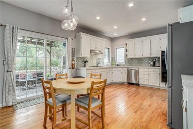 Adjacent to the dining room is the spacious, light