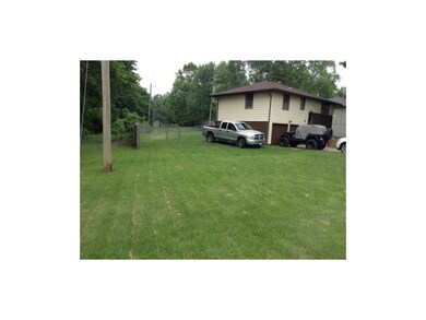 Humongous lot!!  All the way to utility pole!  Onl
