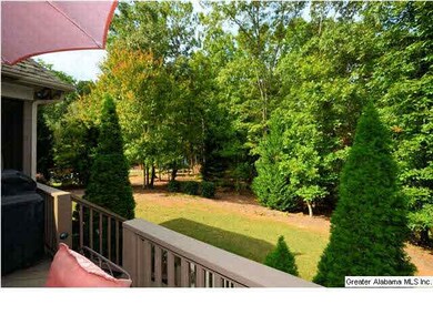 Open grilling deck and screened porch overlook the