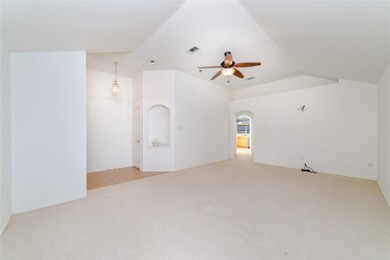 Inside the front door, you are greeted by a tile f