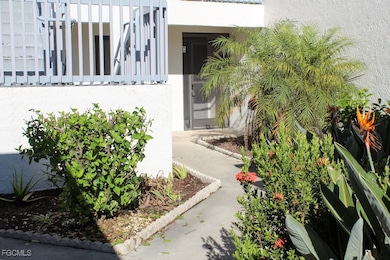 Property entrance with stucco siding