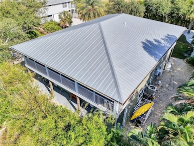 7704 Myrsine Cir unit 10, Bokeelia, FL 33922 - photo 4