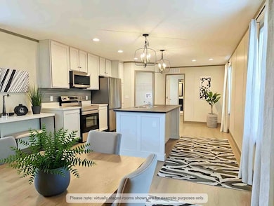 Living Area and Kitchen 2 staged