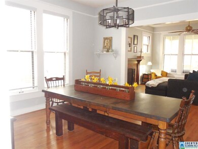 Another view of large dining room with gleaming ha
