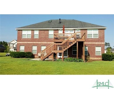 Exterior Back. Upper deck, lower patio is perfect 