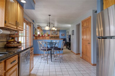The eat in kitchen is open to the family room and