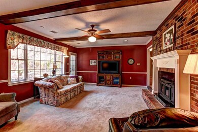 Great Room~Newer Carpet~Fireplace~Chair Rail~Wood 