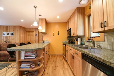 Kitchen with appliances with stainless steel finis