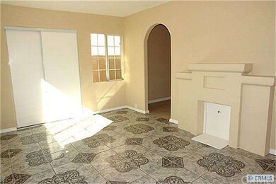 Back house has large living room and ceramic tiled