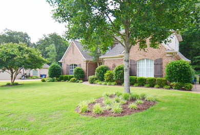 Front of home with landscaping