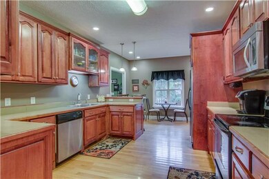 Large kitchen with hardwood flooring