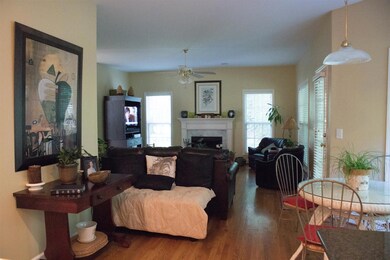 Another View of the Living Room from the Kitchen and Kitchen/ Breakfast Nook Area. Eat Breakfast/ drink coffer & and watch the birds and squirrels play out back!