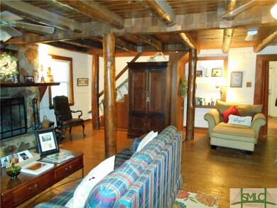 Great Room with beautiful exposed beams.  Log Cabi