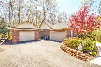 Full 2 car attached garage as well as additional detached garage wired for 220.  Ample parking for boat, RV's, jet skis, etc.