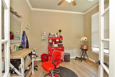 Study or WHATEVER Space has Ceiling Fan and crown 