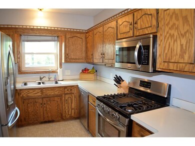 The kitchen has an abundance of cupboards and coun