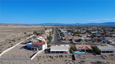 Aerial view of residential area with mountains and