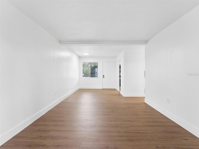 View of Living Room/Dining Room from the Balcony