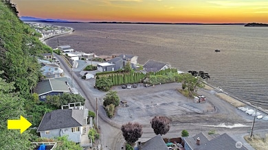 Just steps from Maple Grove boat launch & beach (your view is protected).