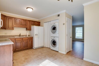 At the end of the kitchen next to the stackables there is pantry space in  two areas