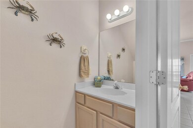 Hallway powder room for guests.