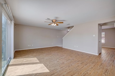 Spare room featuring light wood-style flooring an