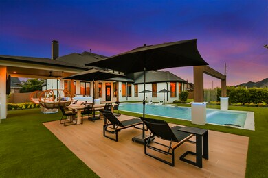 In addition to the main patio area, there's an additional patio space, providing retreats for relaxation and outdoor dining. This extra patio area enhances versatility and comfort, allowing you to fully appreciate the beauty of the outdoor surroundings. The landscaping surrounding the perimeter of the pool and outdoor entertainment area features Wax Myrtles, ensuring privacy and adding to the serene ambiance of the space.