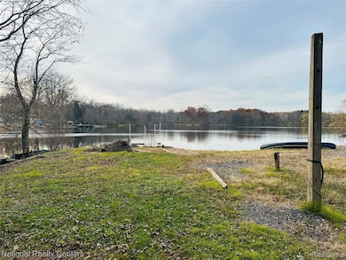 Water view featuring a heavily wooded area