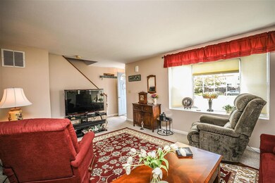 Living Room; Outward view from the side exposing t