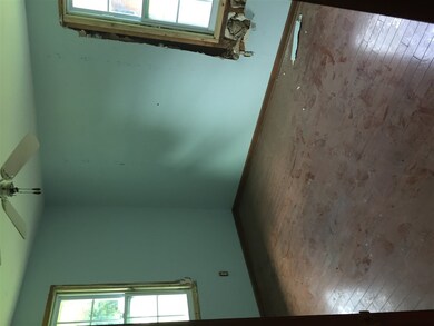 Hardwood floor and new window.