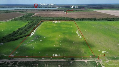 View of rural area with property parcel outlined and a nearby body of water