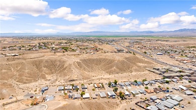 Aerial overview of property's location with a moun