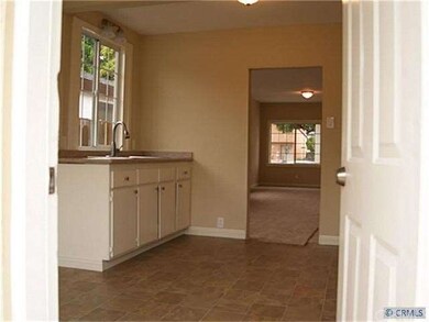 Kitchen looking into living room