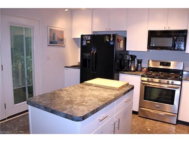 French door to Patio, Jenn-Air, Fridge, Range and 