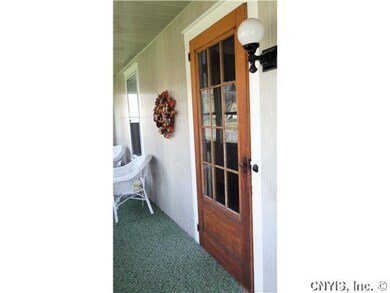 Exterior Front Wooden storn door over the front do