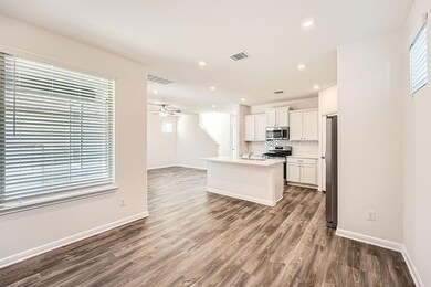 Kitchen featuring appliances with stainless steel