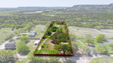 210 William Lot and226 House with .50 acres