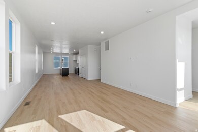 Unfurnished living room with light wood-style floors and recessed lighting
