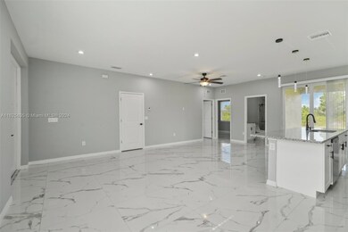 1016 Genoa Ave S, Lehigh Acres, FL 33974 - photo 5