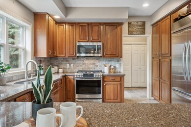 Kitchen with granite countertops and stainless steel appliances