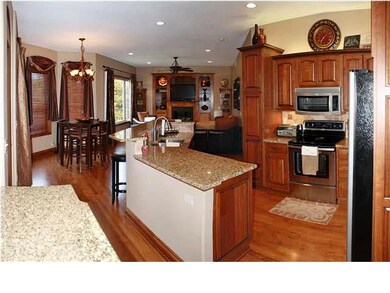 Granite everywhere! Full travertine tile backsplas