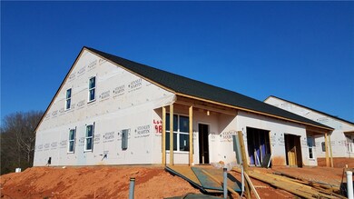 View of backside of home lot 9B Selma 1 car garage