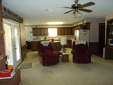 Exterior Front. Den looking towards kitchen..built