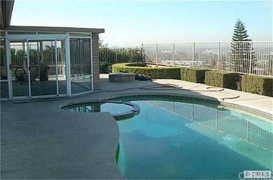 Low maintenance backyard with pool.