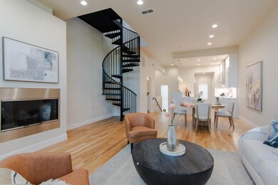 Living room with visible vents, recessed lighting,