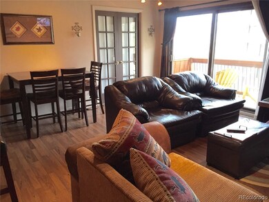 Living room with large sliding glass doors opening
